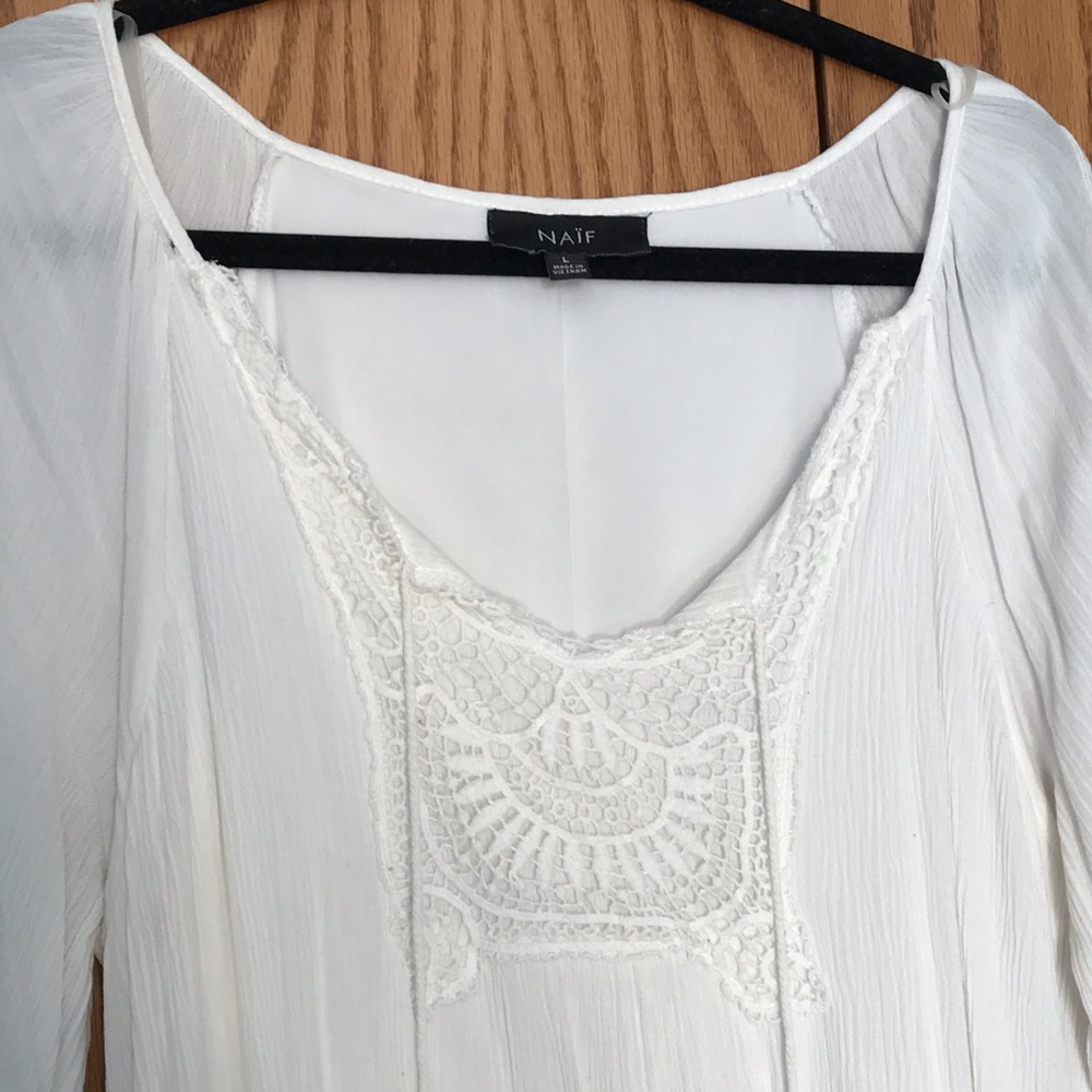 White open-shoulder flowy dress